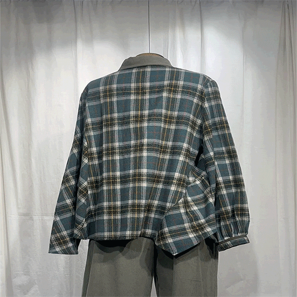 Asymetric check shirt with patch detail