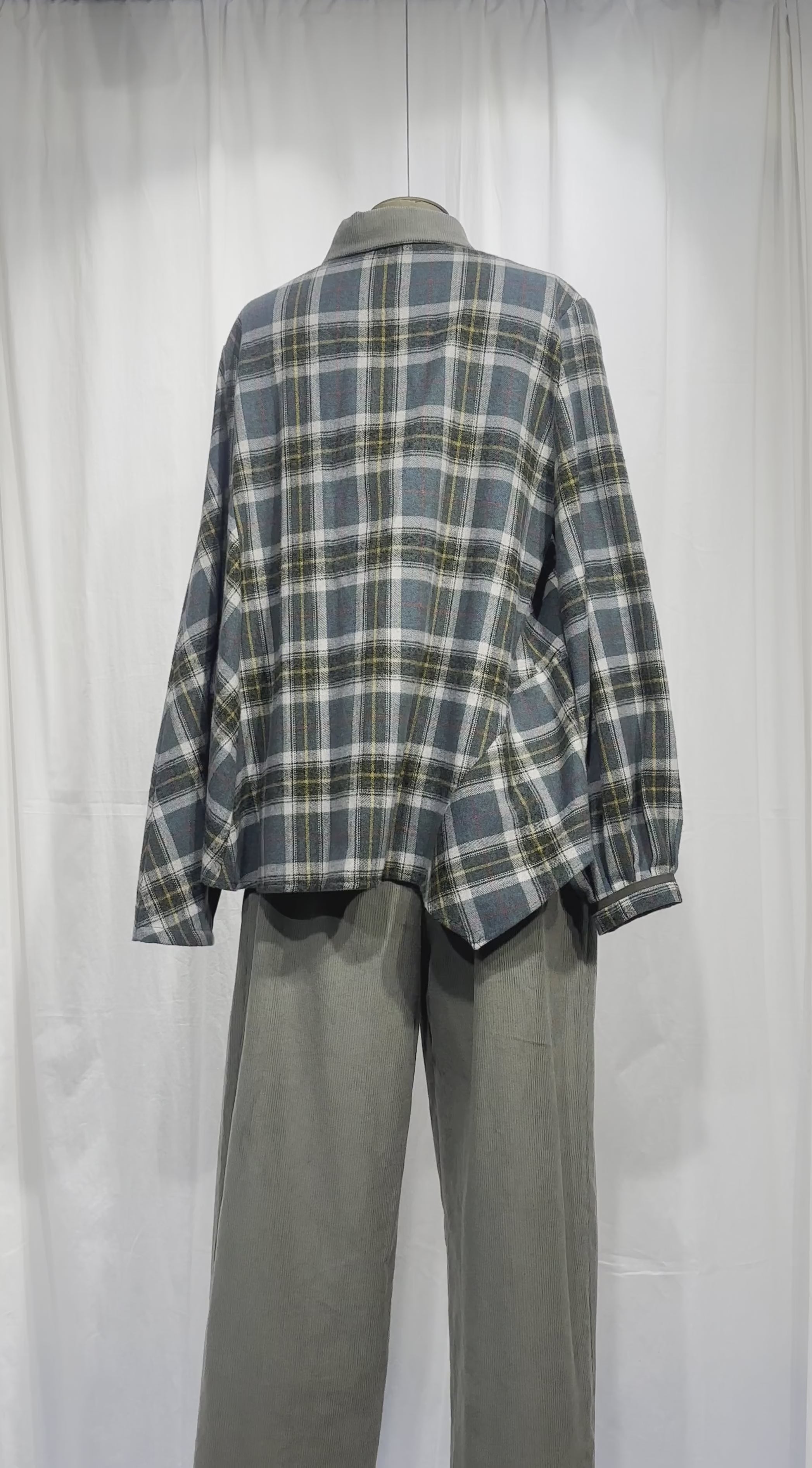 Asymetric check shirt with patch detail